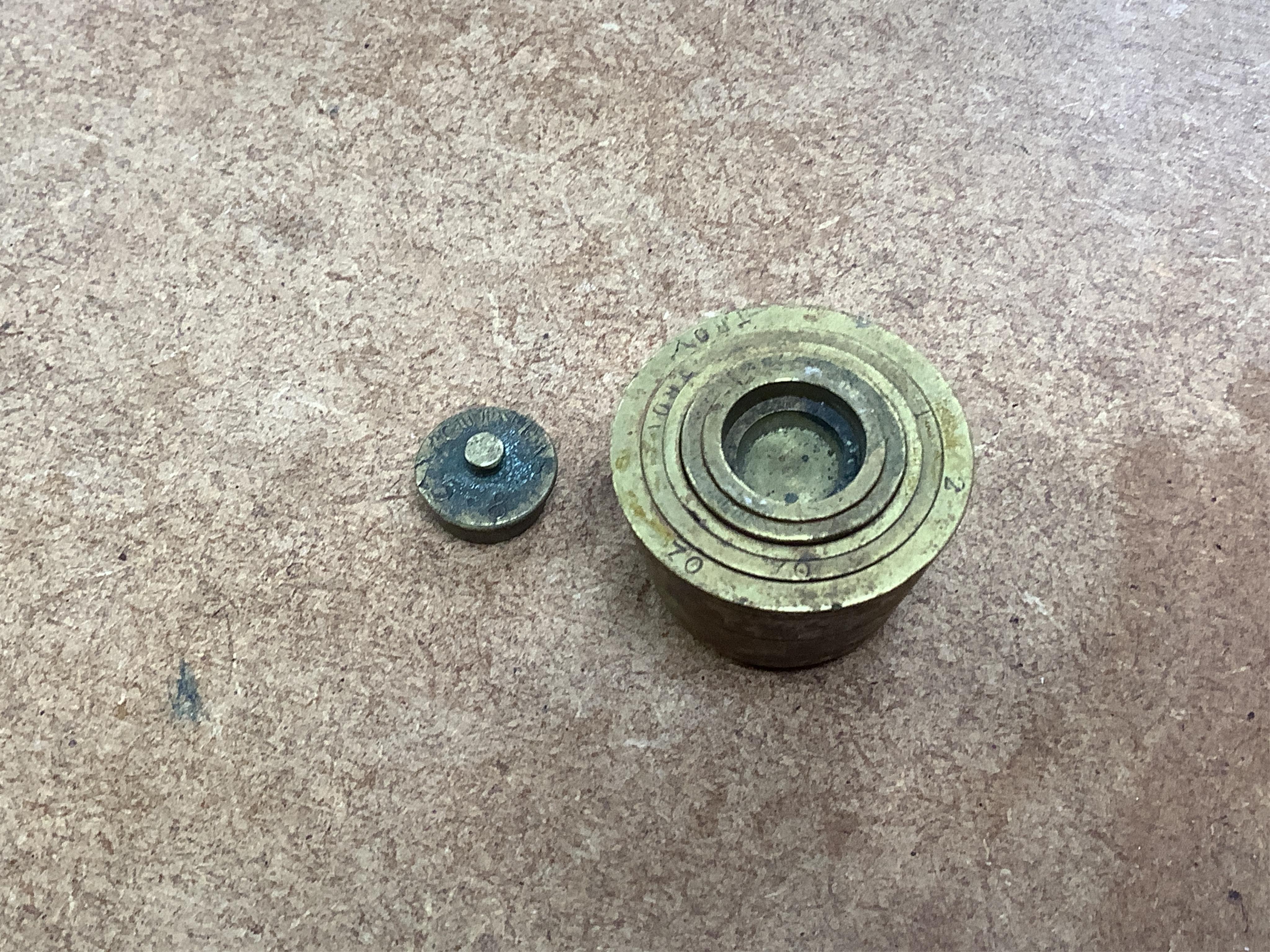 A 19th century mahogany apothecary cabinet, interior with fitting compartments containing twenty-one glass bottles, most with stoppers, five drawers with ivory knobs containing a miniature pestle and water, mixing glasse